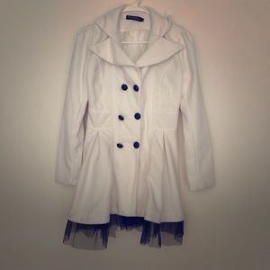 White pea coat with black trim